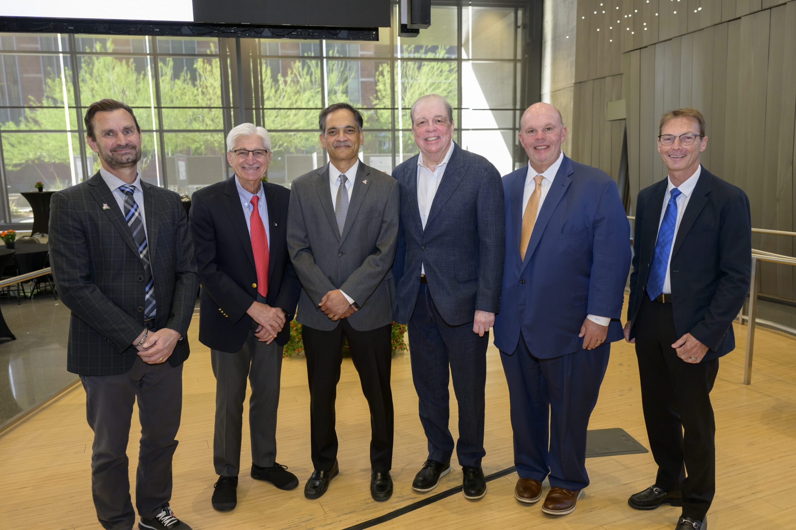 Pictured from left to right Todd Vanderah, Ph.D., director of the Comprehensive Center for Pain & Addiction at the University of Arizona Health Sciences, regents professor and head of the Department of Pharmacology at the College of Medicine – Tucson; Frank Porreca, Ph.D., Cosden professor of pain and addiction studies and associate head of the Department of Pharmacology at the College of Medicine – Tucson, University of Arizona; Suresh Garimella, Ph.D., president of the University of Arizona; Michael Dake, M.D., senior vice president of the University of Arizona Health Sciences; Johnny Stephens, Pharm.D., president of Oklahoma State University Center for Health Sciences; and Don Kyle, Ph.D., chief executive officer of the National Center for Wellness and Recovery at Oklahoma State University Center for Health Sciences at the Opioid in pain and addiction symposium